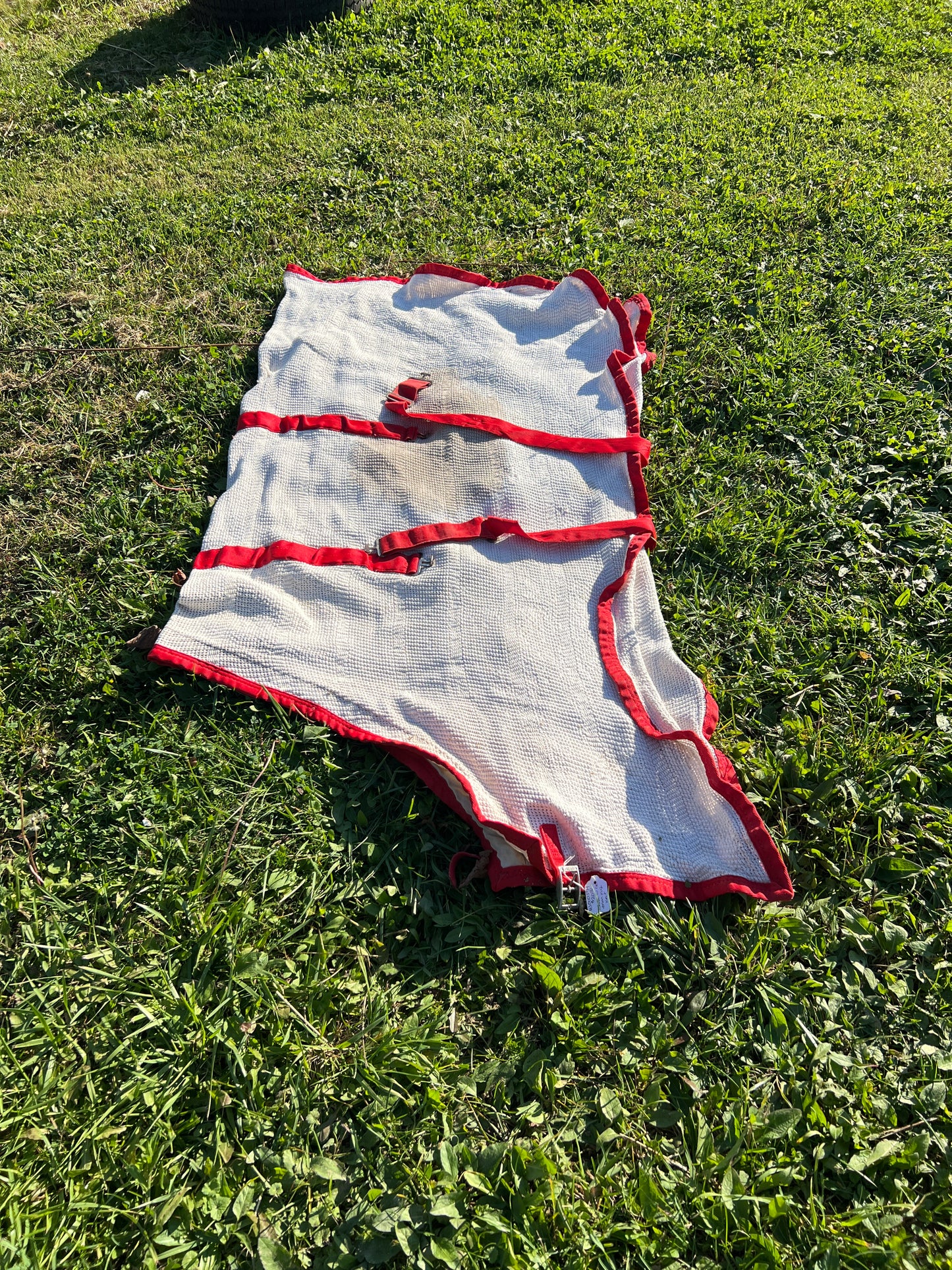64” White  Scrim With Red Binding