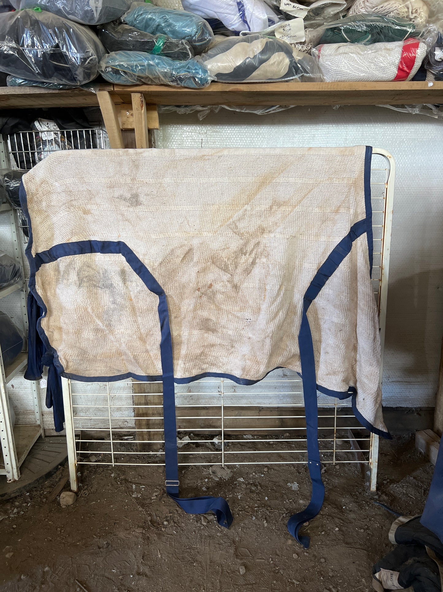 Cream with blue binding Curvon Scrim, 68"