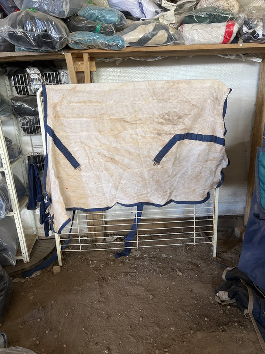 Cream with blue binding Curvon Scrim, 68"